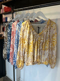 V Neck Bubble Hem Blouse